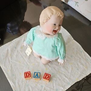Porcelain Baby Doll with Blocks